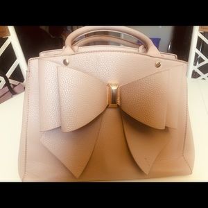 Nude pink purse with bow